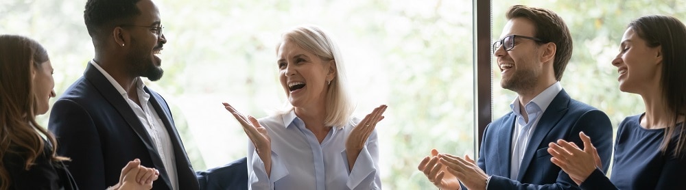 Consultants congratulating each other Consultants congratulating each other