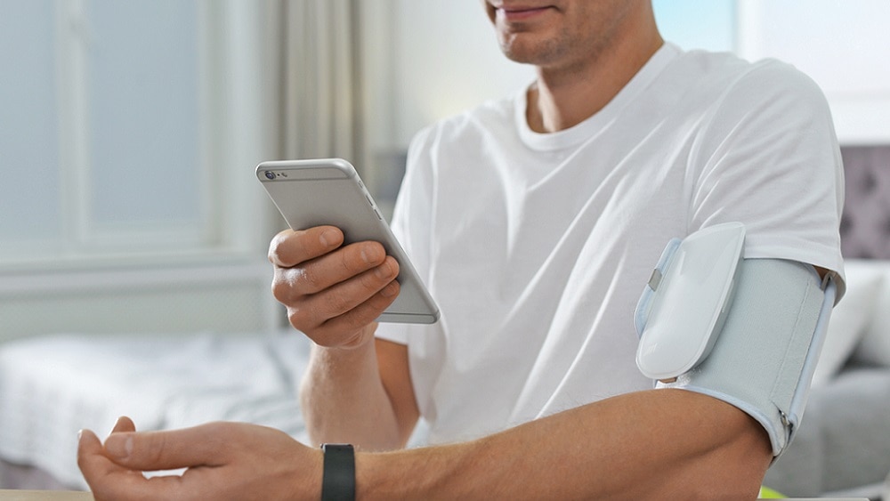 person monitoring their own health data person monitoring their own health data