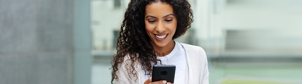 Woman replying to Juror Summons on her phone