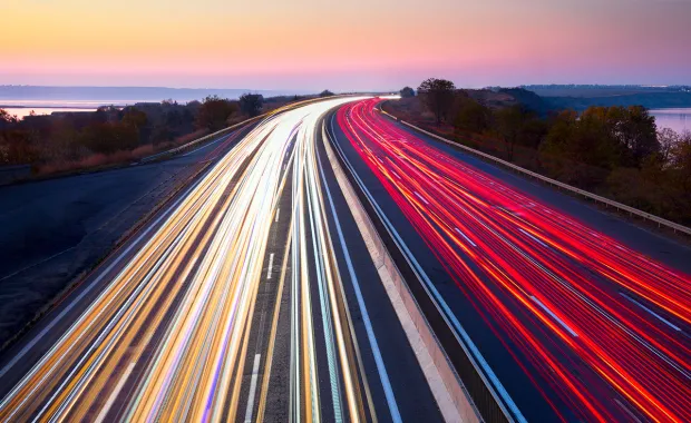 bright car lights on a highway