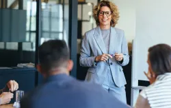 a trusted advisor presents at a meeting