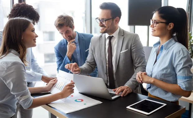colleagues working together at table