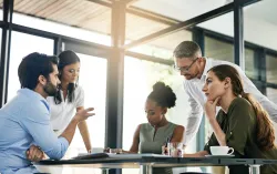 Group of colleagues working at a table