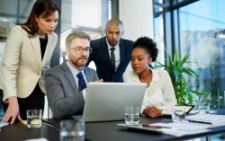group of people working at desk