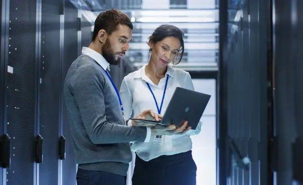 Professionals working together on mainframe modernization