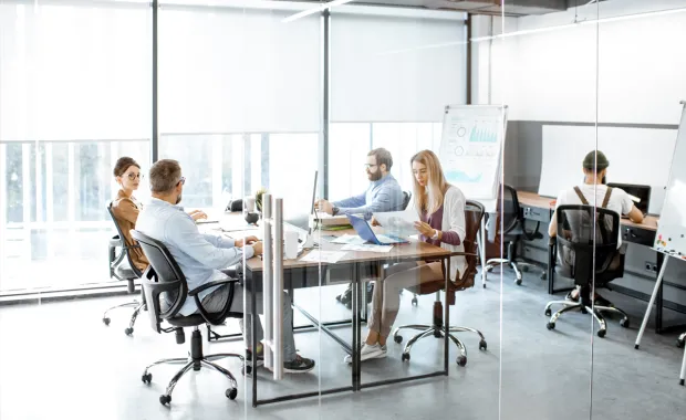Group of testers working at a conference table