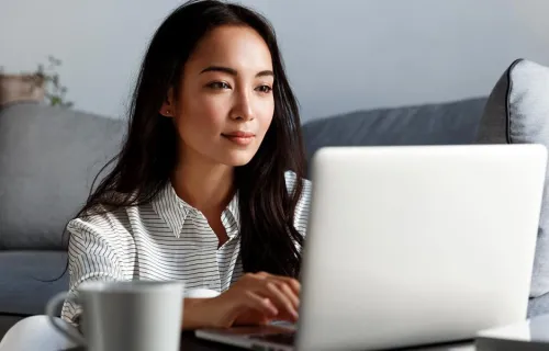 Professional working in her laptop