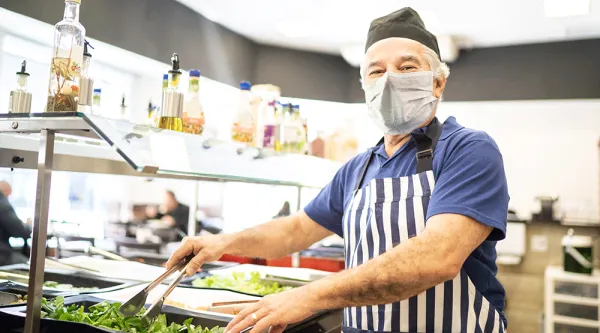 A man cooking in the kitchen