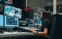 person working in broadcast control room