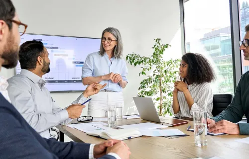 Artificial intelligence workshop team meeting discussing project results