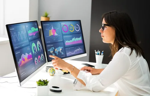 woman working with data on a computer