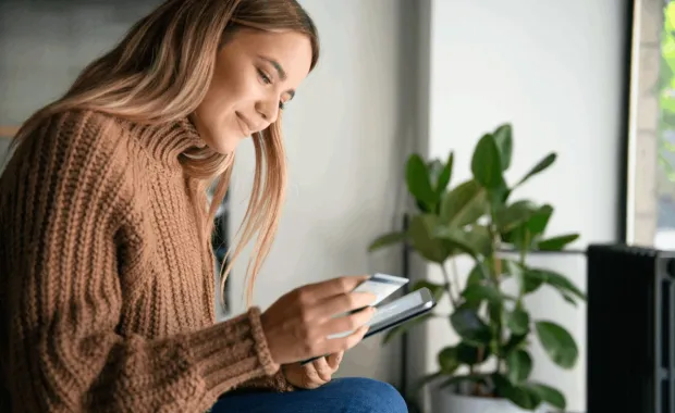women looking at phone